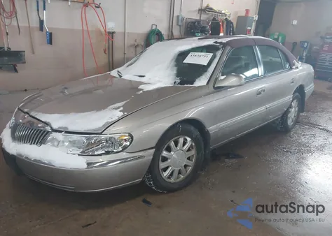 2000 Lincoln Continental z USA, uszkodzony, nr VIN 1LNHM97V5YY861793